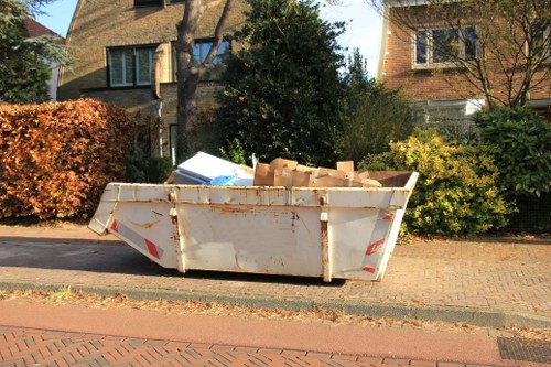 Garden clearance services removing debris and overgrowth in East Dulwich